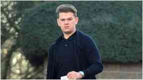 Jailed: Bradley Wallace spat on a priest.