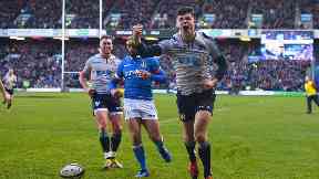 Star man: Kinghorn celebrates his first try.