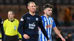 Dejected: Miller rues his penalty miss.