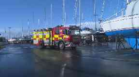 Fire: Crews were called to the marina in the early hours of Sunday morning.
