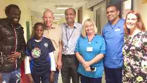 Alieu and the medics who have transformed his life.