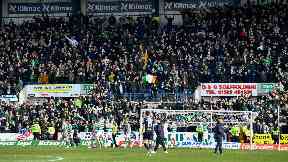 Celtic fans at Dens Park on Sunday.