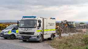 Bomb squad: The 'old war unit' was removed from the scene.