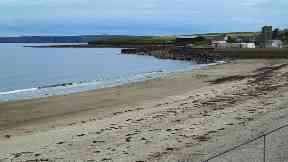 Thurso beach: The woman was cut free after two hours.