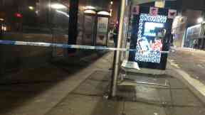 Police: A bus stop was taped off.