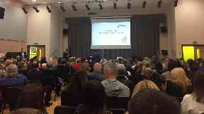 Inside the highly charged public meeting.
