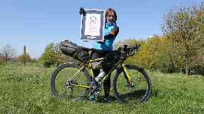 Jenny Graham shows off her world record certificate.