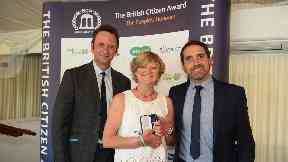 Medal: Corinne Hutton with event host Matt Allwright and Jonny McQuarrie.