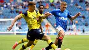 Rangers: Oxford's Josh Ruffels challenges Greg Docherty.