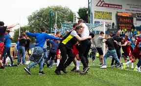 Pitch invasion: After a later Rangers winner.