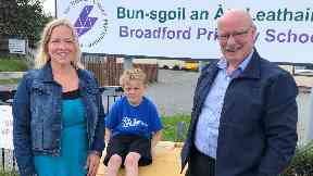 Concerned: Tansy Grigor-Taylor and son Archie with Broadford Community School Working Group chairman Hamish Fraser.