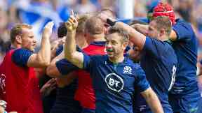 Joy: Greig Laidlaw salutes the crowd as Scotland take the lead at Murrayfield.