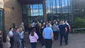 Parents gathered at a public meeting.