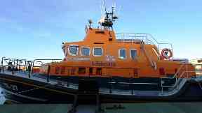 Rescue: A pensioner fell into harbour waters.