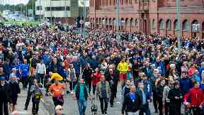Glasgow: Thousands of fans flocked to Ibrox to pay tribute.