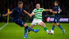 Captain: Scott Brown holds off Lazio's Sergej Milinkovic-Savic.