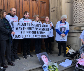 Vigil: Allan Marshall's family.