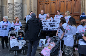 Vigil: Family outside crown office.