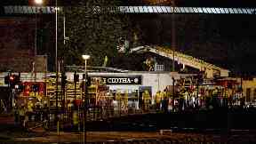Aftermath: Emergency workers at the scene of the crash.