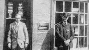 An early picture taken outside the world's oldest post office.