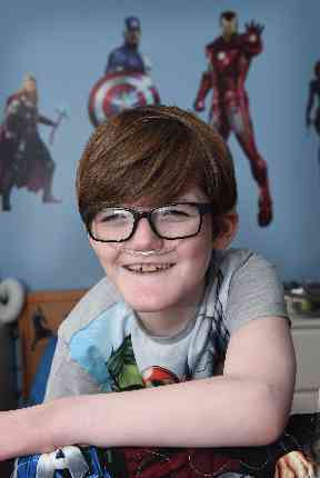 Superhero-loving Aaron dedicated the award to other ROHHAD children.