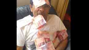 Vojtech Gombar posted images on Facebook with piles of cash.