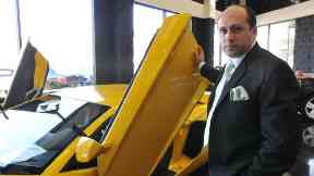 Afzal Khan is accused of running a luxury car scam.