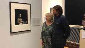 Family: Marion and Grant Hutchison admire the portrait.