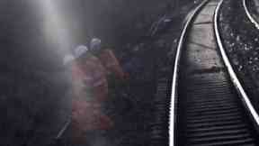 CCTV from the Virgin Train shows the workers fleeing.