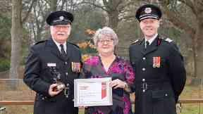 Honour: Dave with wife Michelle and son David