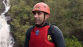Blind daredevil first to abseil UK's tallest waterfall