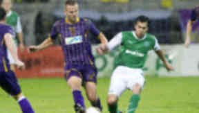 European blow: Dalibor Volas with Hibs’ Ian Murray.