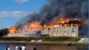 Blaze: Building collapses as crews fight fire